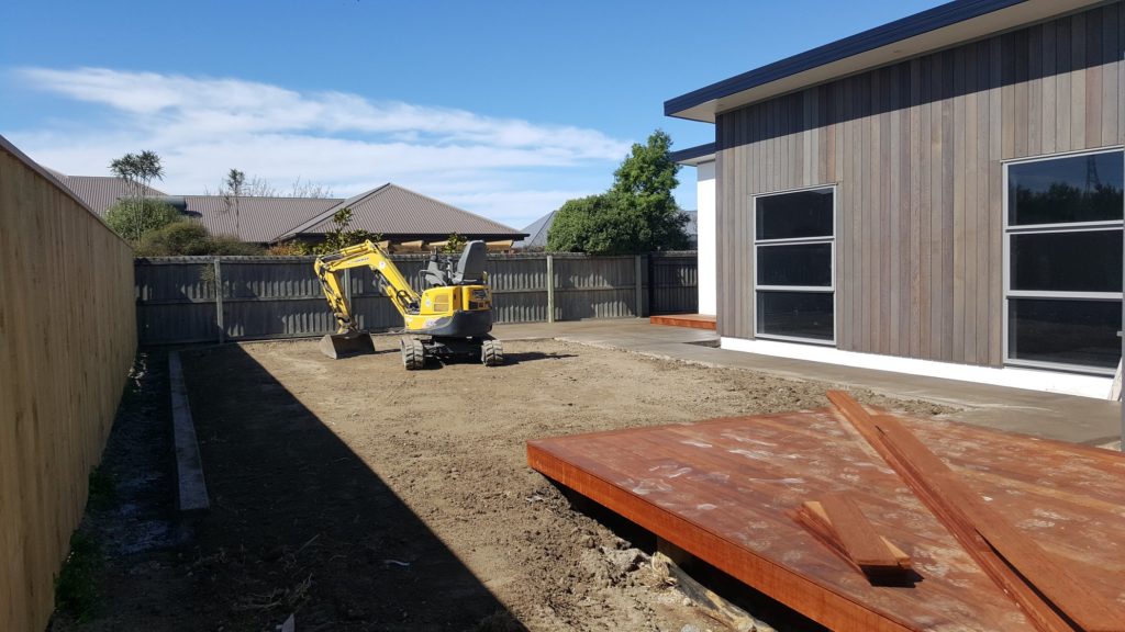 Concrete4U excavating a residential home patio for concrete placement in Oxford