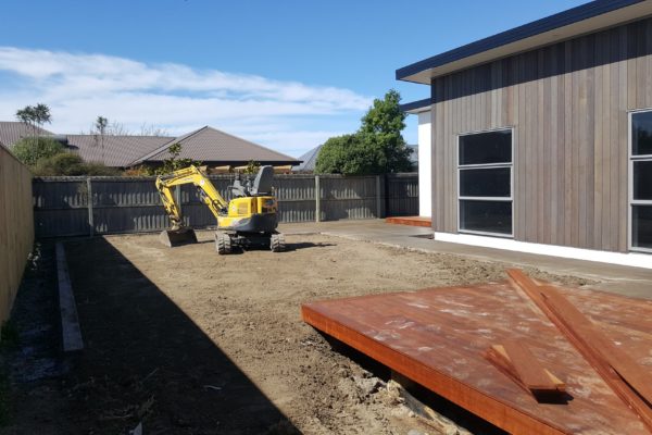 Concrete4U excavating a residential home patio for concrete placement in Oxford