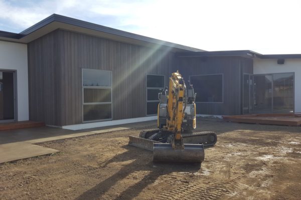 Concrete4U excavating a residential home driveway for concrete placement in Kaiapoi